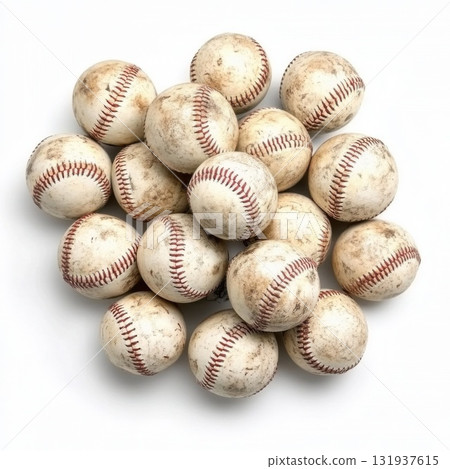 Collection of baseballs showing wear and tear on a white background during a summer afternoon Collection of baseballs showing wear and tear on a white background during a summer afternoon 131937615