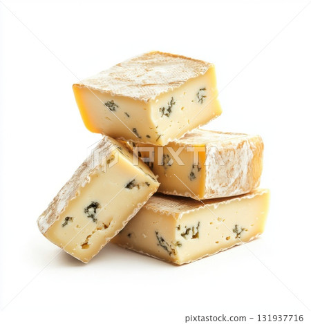 Cheese blocks arranged on a white surface showcasing a flavorful blue cheese variety 131937716