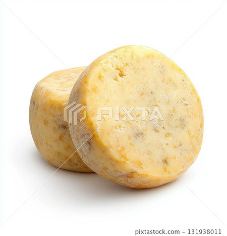 Delightful rounds of cheese ready for tasting in a bright kitchen setting Delightful rounds of cheese ready for tasting in a bright kitchen setting 131938011