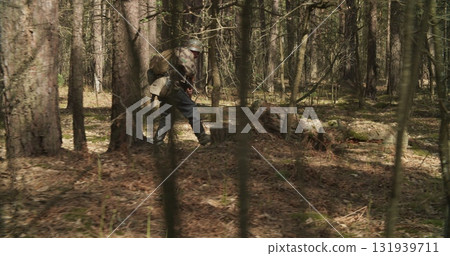 Group Of Soldiers With Carabines Mauser 98k Sneaking Through Forest. Soldier Aiming From Rifle. Wermacht Military Uniform. Reenactors Dressed As German Infantry Soldiers Make War Ambush In Forest Group Of Soldiers With Carabines Mauser 98k Sneaking Through Forest. Soldier Aiming From Rifle. Wermacht Military Uniform. Reenactors Dressed As German Infantry Soldiers Make War Ambush In Forest 131939711