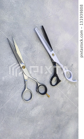 Special hairdressing scissors and comb. Professional equipment. 131939808