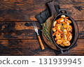Deliciously seasoned grilled shrimp prawns with vibrant colors, a must-have for seafood lovers and culinary enthusiasts. wooden background. top view 131939945
