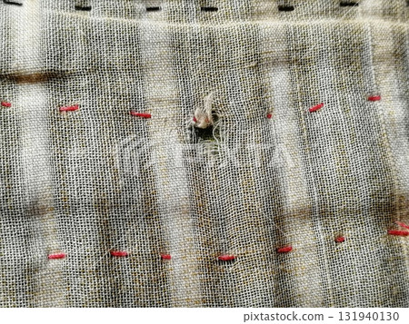 Torn fabric. Frayed cloth background for sample, presentation, safety issue, excessive acid wash warning etc Torn fabric. Frayed cloth background for sample, presentation, safety issue, excessive acid wash warning etc 131940130
