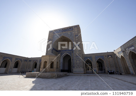 square of Po-i-Kalan, or Poi Kalan is an Islamic religious complex located in Bukhara, Uzbekistan square of Po-i-Kalan, or Poi Kalan is an Islamic religious complex located in Bukhara, Uzbekistan 131940759