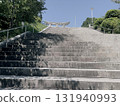 The torii gate comes into view at the end of the stairs 131940993