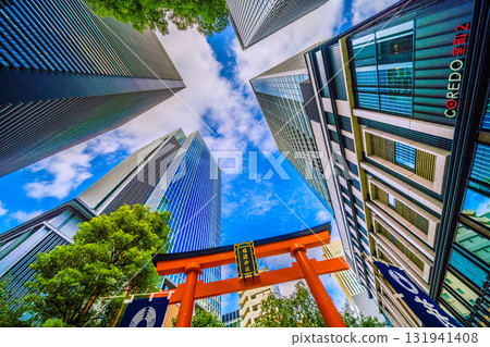 Tokyo cityscape in Japan, with views of Fukutoku Shrine and other shrines in the valley between buildings in Nihonbashi Muromachi 131941408