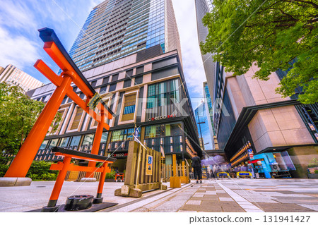 Tokyo cityscape in Japan. View of Fukutoku Shrine in the valley between buildings in Nihonbashi Muromachi. A redeveloped building is in the back right. 131941427