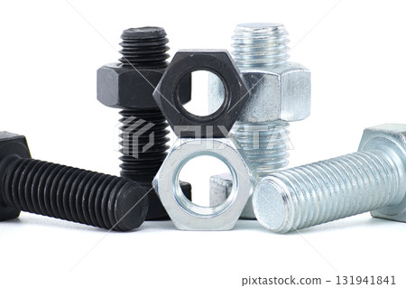 Close-Up of Metal Bolts and Nuts in a Variety of Arrangements Close-Up of Metal Bolts and Nuts in a Variety of Arrangements 131941841