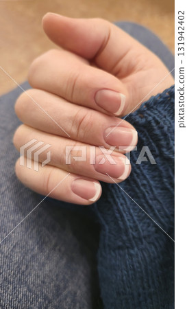 Nail extensions, manicures, nail corrections, hands in the foreground, gel polishes. Nail extensions, manicures, nail corrections, hands in the foreground, gel polishes. 131942402