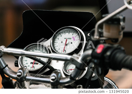 A detailed close-up shot of a motorcycle cockpit, selective focus A detailed close-up shot of a motorcycle cockpit, selective focus 131945020
