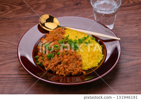Homemade dry curry with minced beef and pork, onions and peppers (turmeric rice) Homemade dry curry with minced beef and pork, onions and peppers (turmeric rice) 131946191