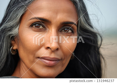 Mature south asian woman with graying hair 131946237