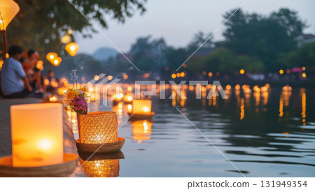 Asian festival Yi Peng lanterns floating on water at night, background 131949354
