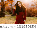 beautiful woman relax in autumn forest 131950854