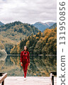 beautiful woman relax in autumn forest 131950856