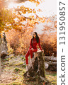 beautiful woman relax in autumn forest 131950857