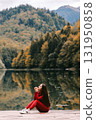 beautiful woman relax in autumn forest 131950858