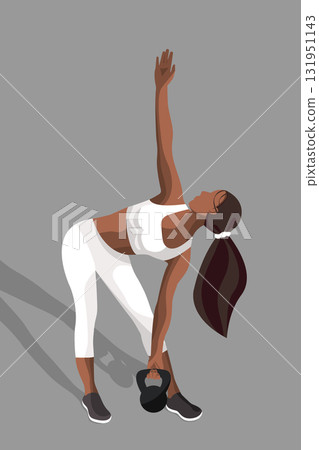 A faceless fitness woman performs a kettlebell exercise, stretching her arm upward. She wears a modern fitness outfit and shows great energy. 131951143