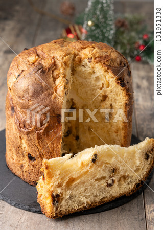 Traditional Italian Panettone on wooden table 131951338