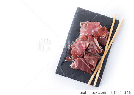 Slices of Spanish Serrano Ham isolated on white background 131951346