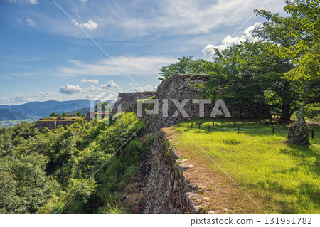 Takeda Castle, the castle in the sea of clouds, with its beautiful stone walls on the summit Takeda Castle, the castle in the sea of clouds, with its beautiful stone walls on the summit 131951782
