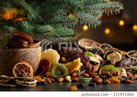 Dried tropical fruits with various nuts and raisins. 131951860