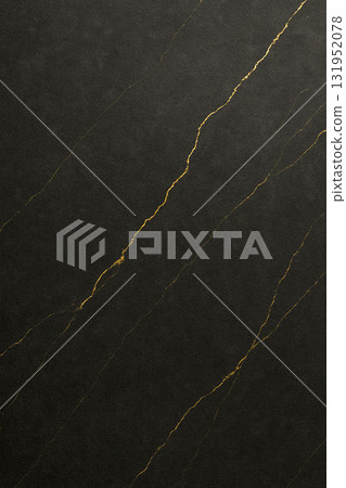 Black marble texture featuring fine golden veins and polished reflective surface 131952078