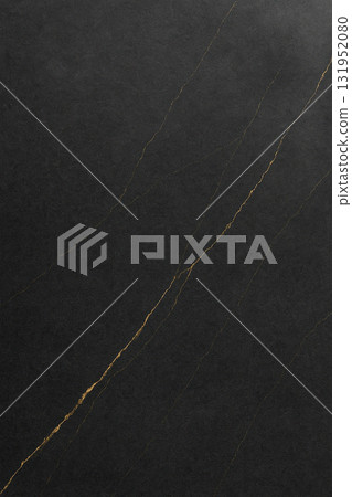 Black marble texture featuring fine golden veins and polished reflective surface 131952080