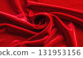 Shiny red satin fabric with soft, smooth waves creates a luxurious, elegant, and passionate textile texture, perfect for a Christmas or Valentine's backdrop 131953156