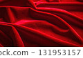 Shiny red satin fabric with soft, smooth waves creates a luxurious, elegant, and passionate textile texture, perfect for a Christmas or Valentine's backdrop 131953157