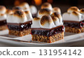 Delicious treat featuring a graham cracker base, berry filling, chocolate layer, topped with toasted marshmallows. Sweet and indulgent dessert. 131954142