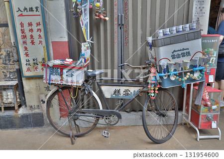 Vintage Bicycle Vendor Cart With Snacks, Beads, And Cans 131954600