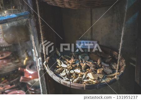 Sept 27 2025 Hanging Basket Of Dried Leaves In A Vintage Shop Display Interior 131955237