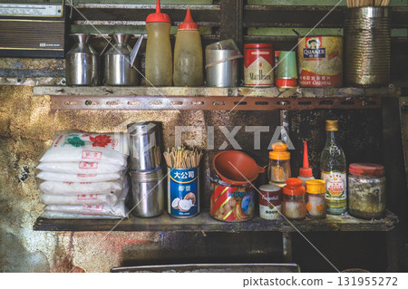 Sept 27 2025 Colorful Kitchen Shelf With Condiments, Cans, And Bottles 131955272