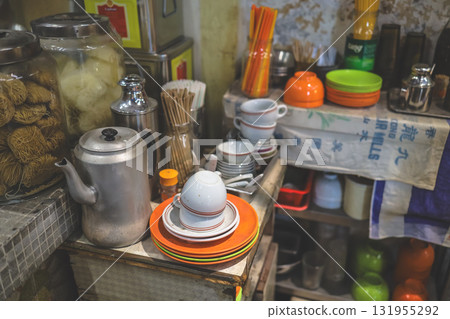 Sept 27 2025 Cozy Kitchen Counter With Teapot, Dishes, Jars, And Utensils 131955292
