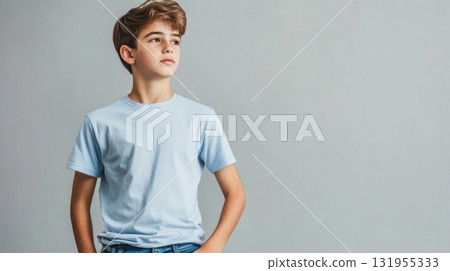 Teenage boy in light blue tshirt. Teenage boy in light blue tshirt. 131955333