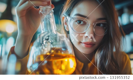 Young Scientist Examining Lab Sample. 131955352