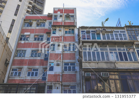Sept 27 2025 Old Urban Building Facade With Glass Windows And Weathered Concrete Sept 27 2025 Old Urban Building Facade With Glass Windows And Weathered Concrete 131955377