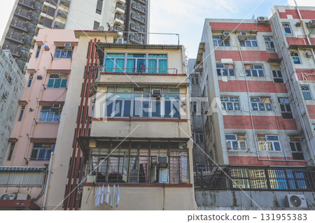 Sept 27 2025 Old Urban Building Facade With Glass Windows And Weathered Concrete 131955383