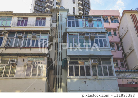 Sept 27 2025 Old Urban Building Facade With Glass Windows And Weathered Concrete Sept 27 2025 Old Urban Building Facade With Glass Windows And Weathered Concrete 131955388