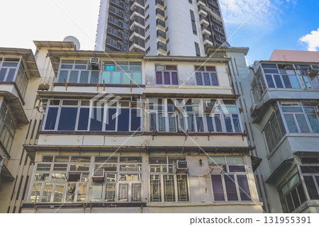 Sept 27 2025 Old Urban Building Facade With Glass Windows And Weathered Concrete Sept 27 2025 Old Urban Building Facade With Glass Windows And Weathered Concrete 131955391