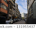 Sept 27 2025 Urban Street Scene With Parked Cars, Old Apartments, 131955437