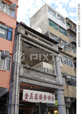Sept 27 2025 Old Urban Building Facade With Balconies And Chinese Sign Sept 27 2025 Old Urban Building Facade With Balconies And Chinese Sign 131955440