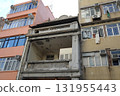 Sept 27 2025 Old Urban Building Facade With Balconies And Chinese Sign 131955443