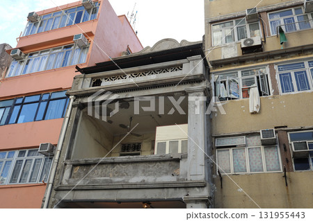 Sept 27 2025 Old Urban Building Facade With Balconies And Chinese Sign Sept 27 2025 Old Urban Building Facade With Balconies And Chinese Sign 131955443