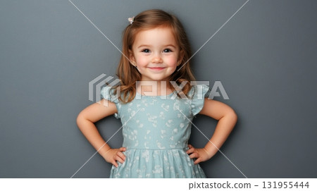 Adorable girl in a pretty dress. Adorable girl in a pretty dress. 131955444