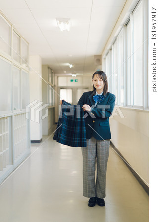 High school girl in pants style with a skirt 131957917