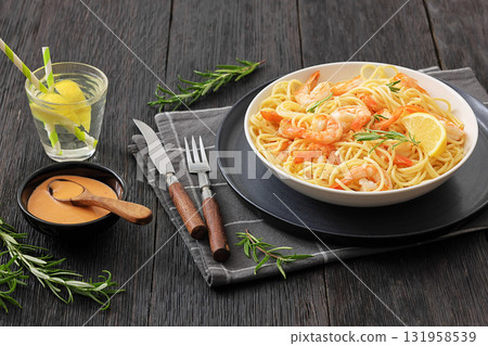 yummy spaghetti with shrimps in a white bowl 131958539
