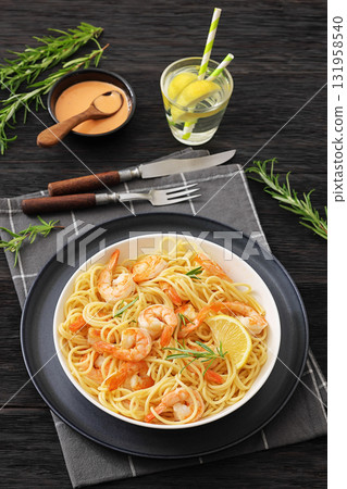 yummy spaghetti with shrimps in a white bowl 131958540