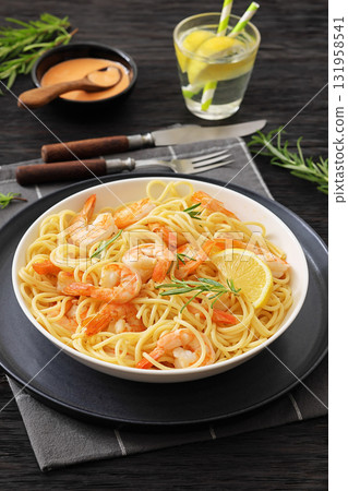 yummy spaghetti with shrimps in a white bowl yummy spaghetti with shrimps in a white bowl 131958541